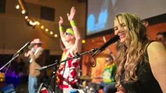 Guests singing with the band at Live Band Karaoke
